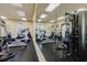 Bright fitness center equipped with treadmills, elliptical trainers and weight machines at 12749 Weatherstone Dr, Spring Hill, FL 34609