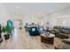 Spacious living room with a seamless flow to the kitchen, perfect for modern living and entertaining at 12749 Weatherstone Dr, Spring Hill, FL 34609
