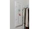 Utility panel in the home with wifi thermostat and safety features at 12749 Weatherstone Dr, Spring Hill, FL 34609