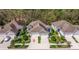 Aerial view of community featuring mature landscaping, sidewalks, and green spaces at 13574 Circa Crossing Dr, Lithia, FL 33547