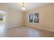 Bright bedroom with neutral walls, tile flooring, and a window offering views of the outdoors at 13574 Circa Crossing Dr, Lithia, FL 33547