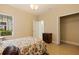 Comfortable bedroom with closet, neutral walls and beautiful natural light from the large window at 13574 Circa Crossing Dr, Lithia, FL 33547