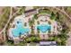 Aerial view of the luxurious community pool area with zone, showcasing an outdoor oasis at 13574 Circa Crossing Dr, Lithia, FL 33547