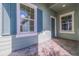 Charming entrance with stone tile and teal accents at 13574 Circa Crossing Dr, Lithia, FL 33547