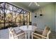 Outdoor lanai features comfortable seating and a screened enclosure at 13574 Circa Crossing Dr, Lithia, FL 33547