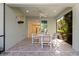 Relaxing lanai features comfortable seating and a ceiling fan at 13574 Circa Crossing Dr, Lithia, FL 33547