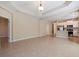 Bright living space with an open floor plan that flows seamlessly into the kitchen at 13574 Circa Crossing Dr, Lithia, FL 33547