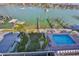 View of the backyard with pool and the harbor at 140 Brightwater Dr # 1, Clearwater Beach, FL 33767