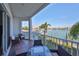 Waterfront balcony featuring outdoor seating and scenic views at 140 Brightwater Dr # 1, Clearwater Beach, FL 33767