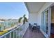 Balcony with seating and a view of the water at 140 Brightwater Dr # 1, Clearwater Beach, FL 33767