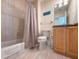 Well-maintained bathroom with tub and shower combo and vanity at 140 Brightwater Dr # 1, Clearwater Beach, FL 33767
