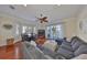 Spacious living room with water views, modern furnishings, and hardwood floors at 140 Brightwater Dr # 1, Clearwater Beach, FL 33767