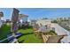 Relax on this rooftop deck with outdoor table and chairs, and plenty of space for entertaining at 140 Brightwater Dr # 1, Clearwater Beach, FL 33767