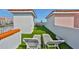 Rooftop terrace with artificial turf and lounge chairs at 140 Brightwater Dr # 1, Clearwater Beach, FL 33767