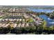Beautiful aerial view of a residential community with lakes and lush landscaping at 15908 Cobble Mill Dr, Wimauma, FL 33598