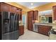 Well-designed kitchen featuring stainless steel appliances and granite counters at 15908 Cobble Mill Dr, Wimauma, FL 33598