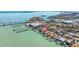 An aerial view of the waterfront home with docks and neighborhood amenities at 173 1St W St, Tierra Verde, FL 33715