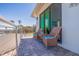 Outdoor balcony with cozy seating and scenic water views, providing a relaxing atmosphere at 173 1St W St, Tierra Verde, FL 33715
