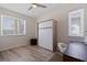 Versatile room with Murphy bed, ample natural light, and modern finishes, ideal for guest or office space at 173 1St W St, Tierra Verde, FL 33715