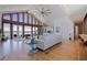 Open-concept living area boasts cathedral ceilings, waterfront views, and modern finishes at 173 1St W St, Tierra Verde, FL 33715