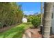 Secluded backyard featuring lush landscaping, a storage shed, and a well-maintained lawn at 209 17Th N Ave, St Petersburg, FL 33704