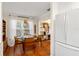 Cozy dining area featuring hardwood floors and a charming view of a bookcase at 209 17Th N Ave, St Petersburg, FL 33704