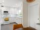Bright kitchen features white cabinets, modern appliances, and a stylish tile backsplash at 209 17Th N Ave, St Petersburg, FL 33704