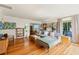Bright living room with hardwood floors, neutral color palette, comfortable sofa, and stylish decor at 209 17Th N Ave, St Petersburg, FL 33704