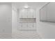Bright dining room with modern white cabinets at 209 Ne Lincoln N Cir # 105, St Petersburg, FL 33702