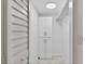 A walk-in closet features built-in shelving for optimal storage solutions at 209 Ne Lincoln N Cir # 105, St Petersburg, FL 33702