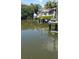 A waterfront home includes a private dock with a boat lift at 2107 S West Shore Blvd, Tampa, FL 33629