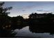 Waterfront house with a boat on the canal, surrounded by lush trees and a beautiful view at 2107 S West Shore Blvd, Tampa, FL 33629