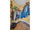 Organized walk-in closet with shelving and hanging space at 2537 Gloriosa Dr # 2, Palm Harbor, FL 34684