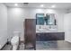 Bright bathroom with double vanity, modern fixtures, and stylish floor tiling at 289 8Th N Ave, Tierra Verde, FL 33715