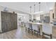 Spacious kitchen featuring a breakfast bar, modern appliances, and ample storage space at 289 8Th N Ave, Tierra Verde, FL 33715