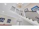 Bright foyer showcasing staircase with modern railings, beautiful chandelier, and stylish decor at 289 8Th N Ave, Tierra Verde, FL 33715