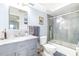 Bathroom with vanity, neutral paint, a tub and shower combo and modern fixtures at 3500 El Conquistador Pkwy # 242, Bradenton, FL 34210
