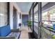 Serene screened lanai with cozy seating and lush views, perfect for relaxation at 3500 El Conquistador Pkwy # 242, Bradenton, FL 34210