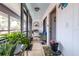 Inviting screened lanai featuring comfortable seating and peaceful ambiance at 3500 El Conquistador Pkwy # 242, Bradenton, FL 34210