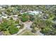 An aerial view of a neighborhood nearby full of houses and trees, plus a church at 3601 N 18Th St, Tampa, FL 33605
