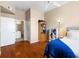 Spacious bedroom with wood floors, storage, and natural light at 4209 Woodstorks Walk Way # 1304, Lutz, FL 33558