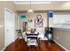 Bright dining area with hardwood floors and room for a dining table and chairs at 4209 Woodstorks Walk Way # 1304, Lutz, FL 33558