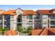 Well-maintained building featuring a balcony and a desirable address at 4209 Woodstorks Walk Way #1304 Lutz, FL 33558 at 4209 Woodstorks Walk Way # 1304, Lutz, FL 33558