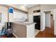 Bright kitchen with granite countertops and stainless steel appliances at 4209 Woodstorks Walk Way # 1304, Lutz, FL 33558