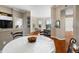 Living space featuring an open floor plan connecting the dining area and kitchen at 4209 Woodstorks Walk Way # 1304, Lutz, FL 33558