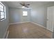 Large bedroom with tile floors and natural light from the large window at 4501 67Th N St, St Petersburg, FL 33709