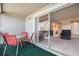 Balcony with table and chairs overlooking the interior of the condo at 6311 Newtown Cir # 11B2, Tampa, FL 33615