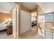 Hallway with closet, bedrooms, and staircase at 6311 Newtown Cir # 11B2, Tampa, FL 33615