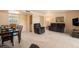 Spacious living room with dining area and comfortable furnishings at 6311 Newtown Cir # 11B2, Tampa, FL 33615