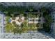 Stunning aerial view of the community's lush courtyard with a fountain, mature trees, and manicured gardens at 700 S Harbour Island Blvd # 204, Tampa, FL 33602